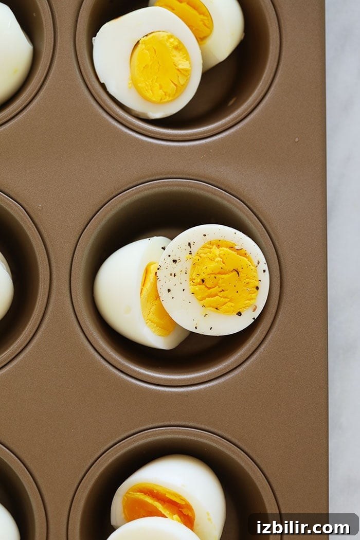 hard boiled eggs in a muffin tin