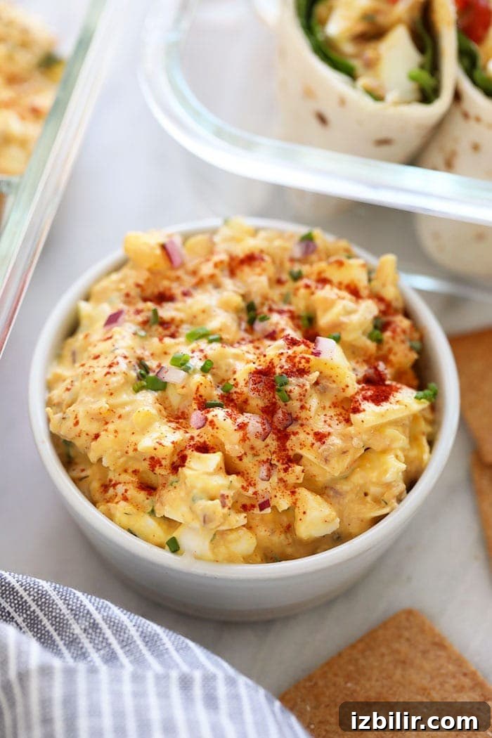 This Tuna Egg Salad blends the flavors you love from tuna salad with egg salad for a satisfying and protein-packed lunch! tuna egg salad in a bowl