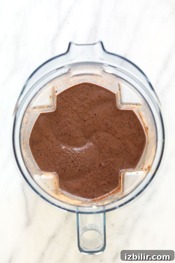 Blended smoothie superfood protein smoothie in a blender