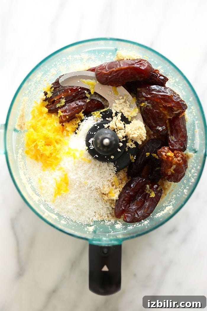 Blending the dough energy ball ingredients in a food processor