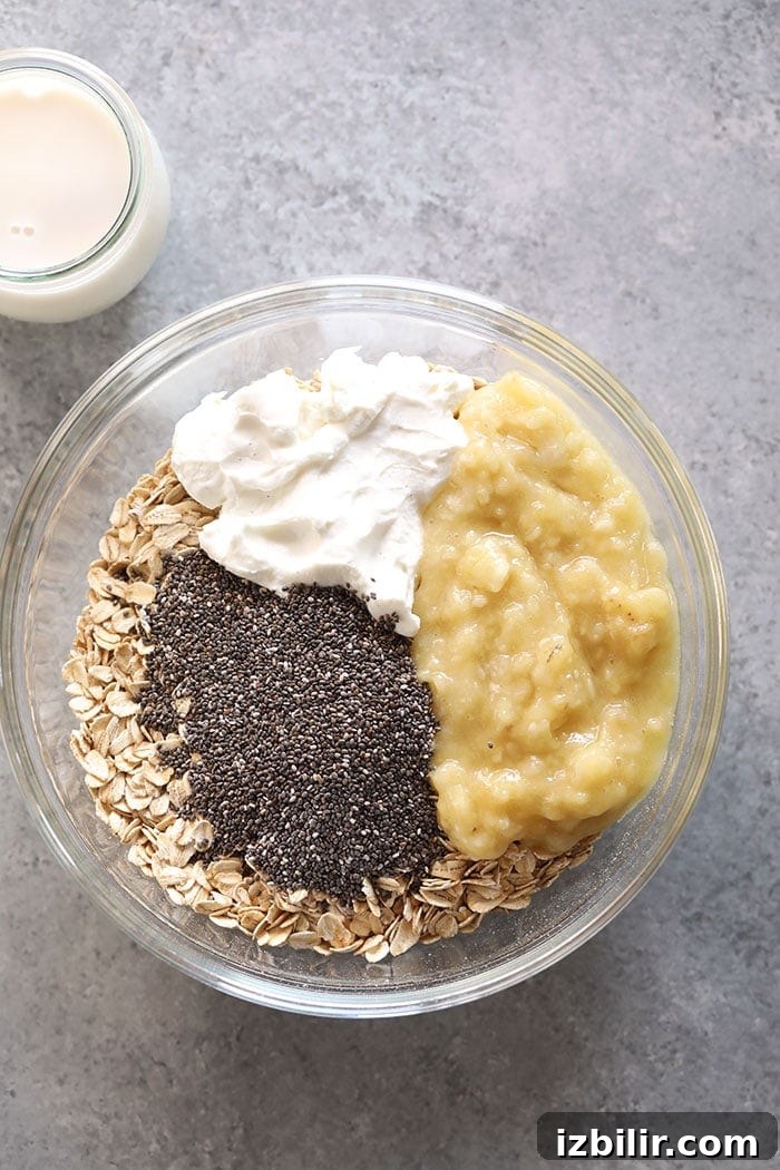 creamy banana overnight oats ingredients in a bowl