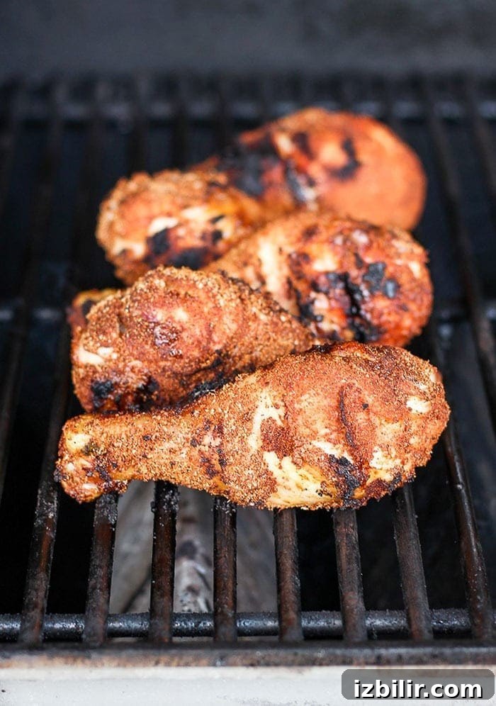 Chicken legs grilling chicken legs on grill.