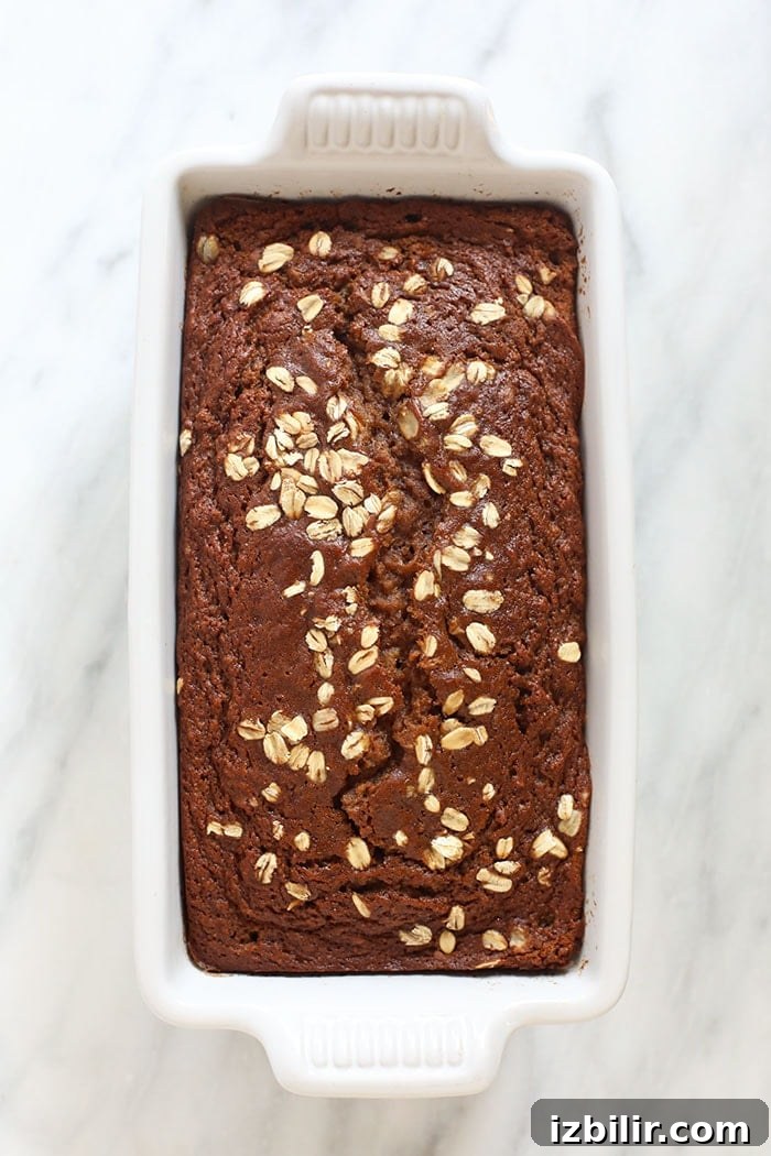 Homemade Apple Cinnamon Bread Recipe 4 Cinnamon apple bread loaf in a loaf pan.