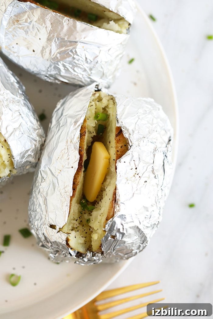 Crispy Foil-Wrapped Baked Potatoes 7 idaho potatoes in foil with butter