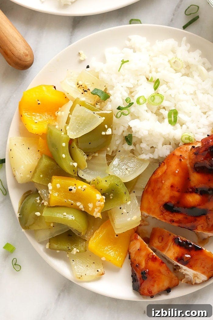With just 5 ingredients, you can make this super simple (and healthy) grilled peppers and onions recipe in a foil pack! grilled peppers and onions