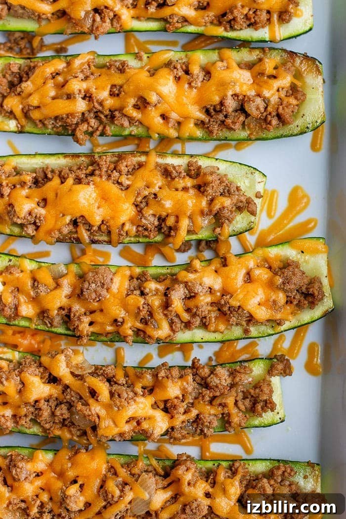 taco zucchini boats in a baking dish looking delicious