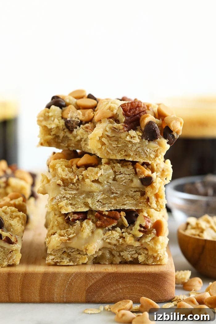 three carmelitas stacked on a cutting board