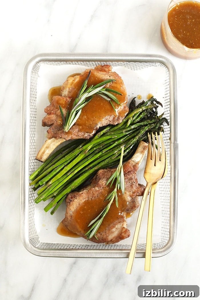 Instant Pot pork chops with gravy and asparagus 2 pork chops and gravy with asparagus
