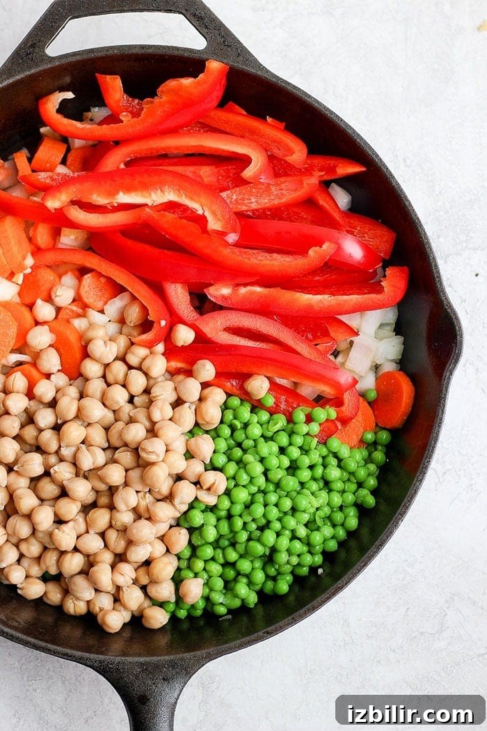 Sautéed vegetables for cashew curry creamy cashew curry vegetables in a cast iron skillet
