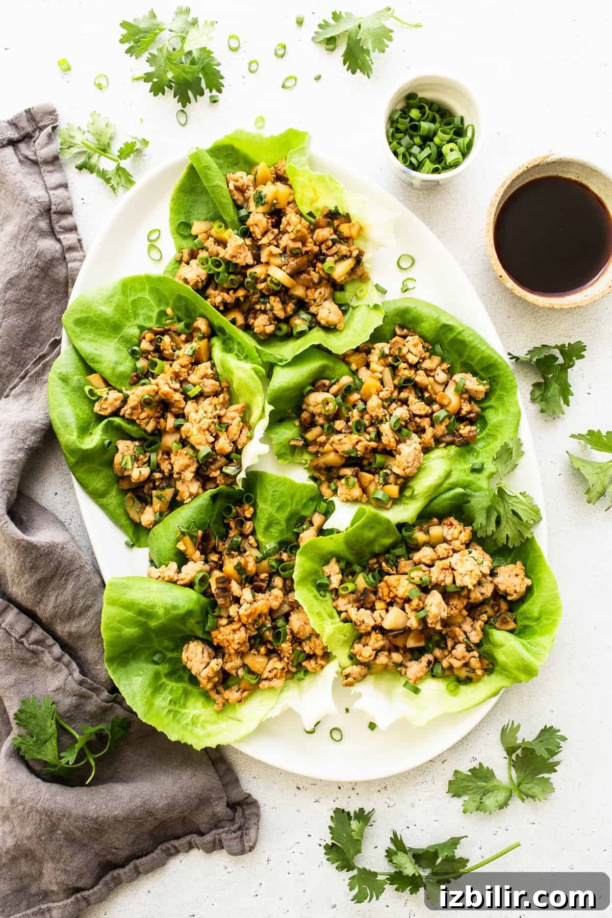 Chicken lettuce wraps ready to serve. ground chicken lettuce wraps on platter.