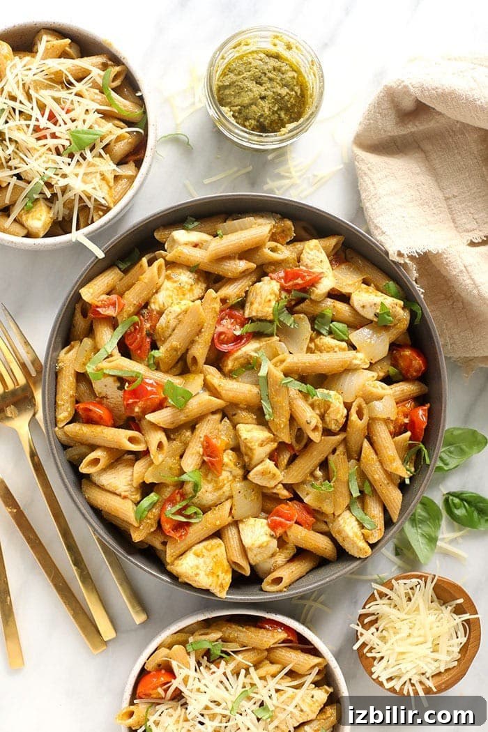 Pesto chicken pasta in a bowl.