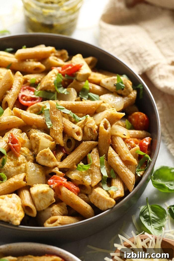pesto chicken pasta in a bowl