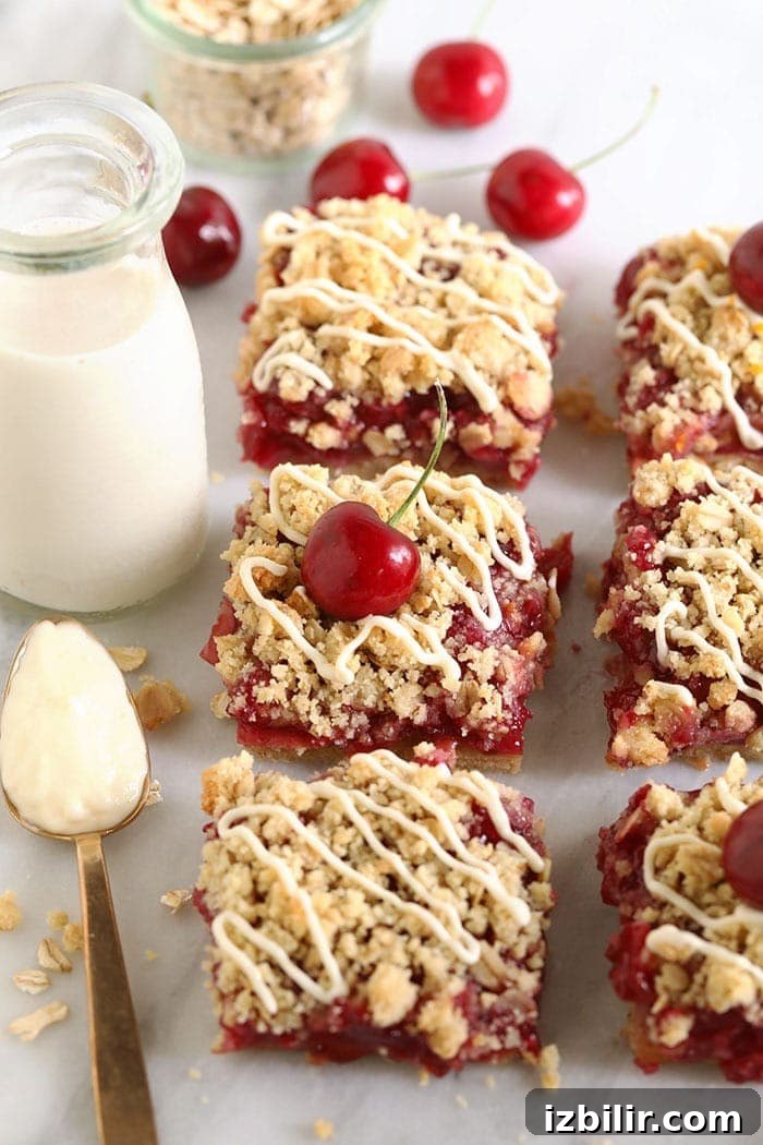 Cherry cobbler bars with almond flour crust cherry pie bars on a cutting board