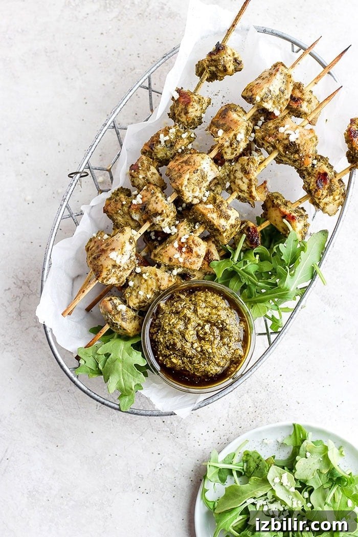 grilled chicken skewers in a basket.