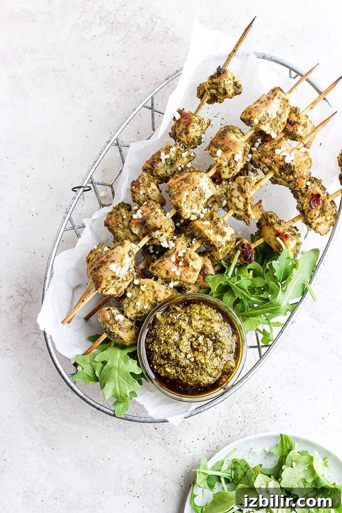 chicken skewers in a basket.