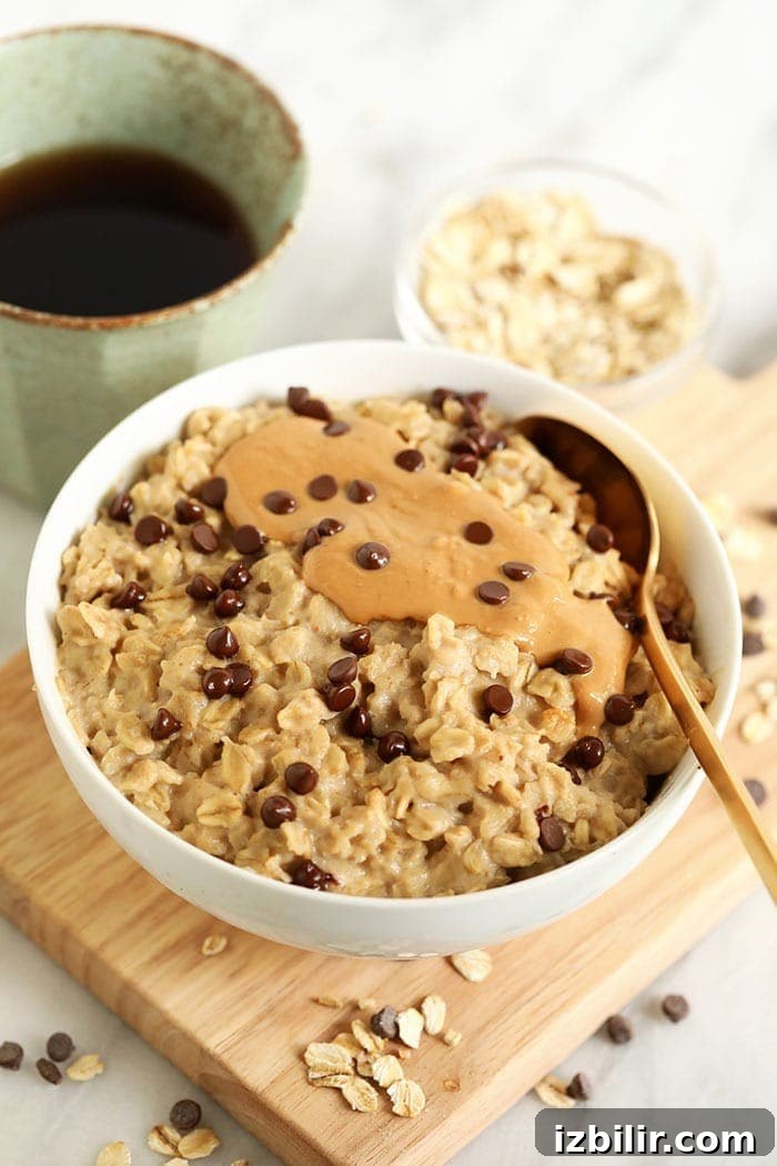 Make Microwave Oatmeal in 2 Minutes 4 oatmeal with cashew butter and chocolate chips in bowl