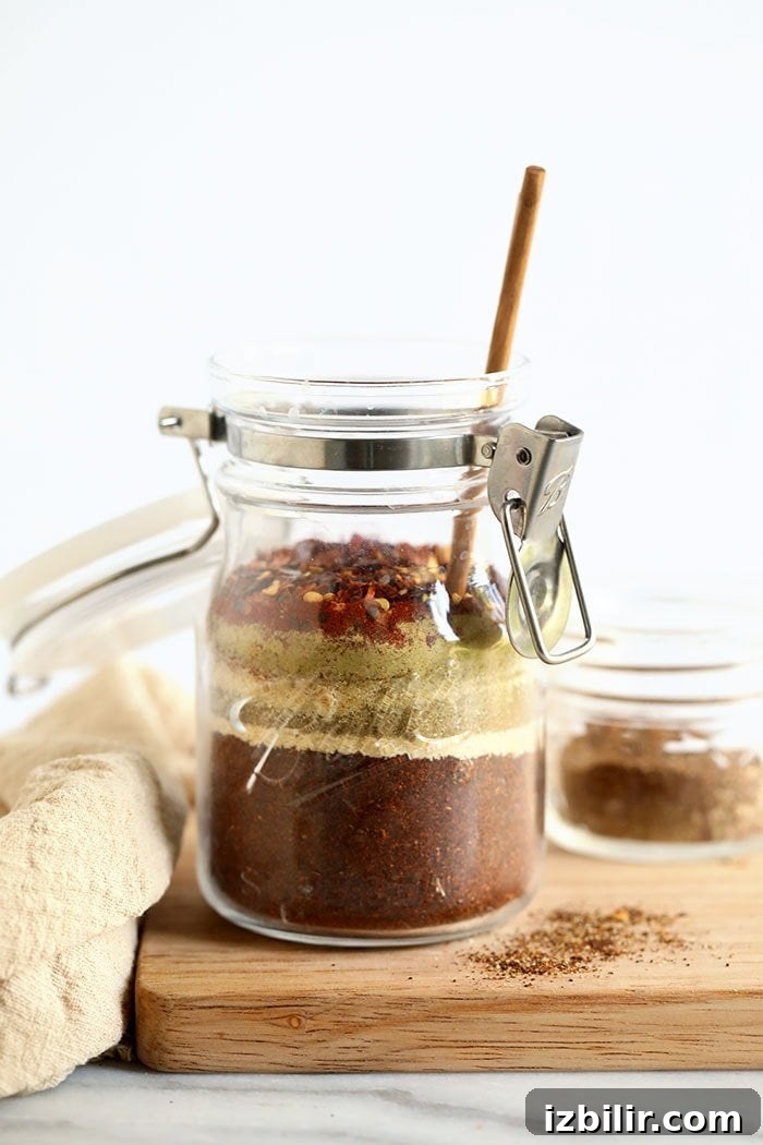 Homemade taco seasoning in a jar.