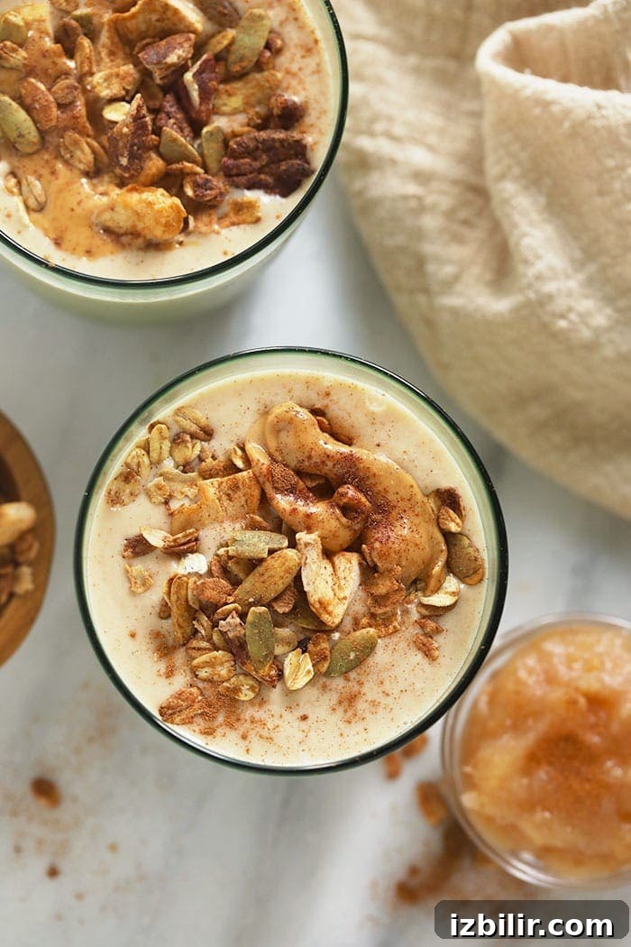 Creamy Apple Smoothie with Cinnamon and Greek Yogurt 4 apple smoothie topped with nut butter and granola