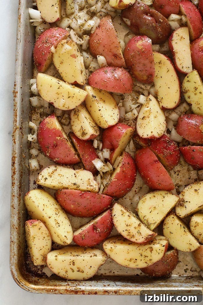 Red potatoes on a baking sheet Red potatoes on a baking sheet