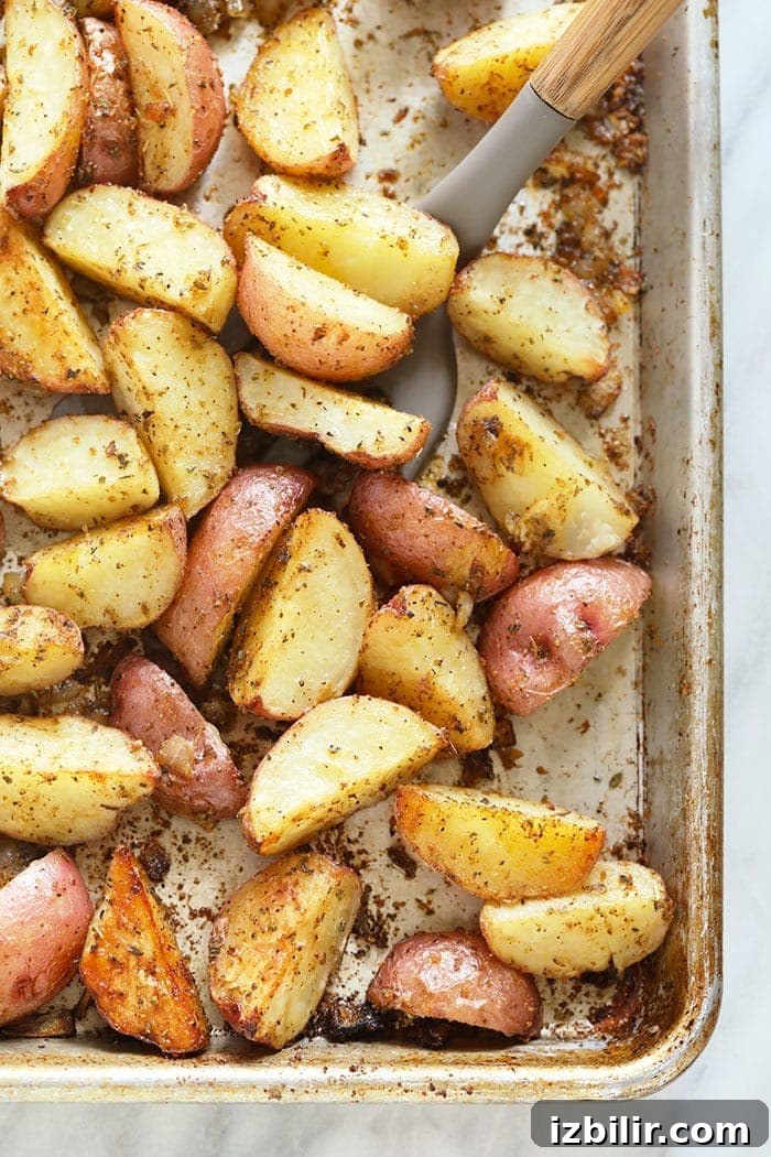 Perfect oven roasted red potatoes Tossing red potatoes on a pan