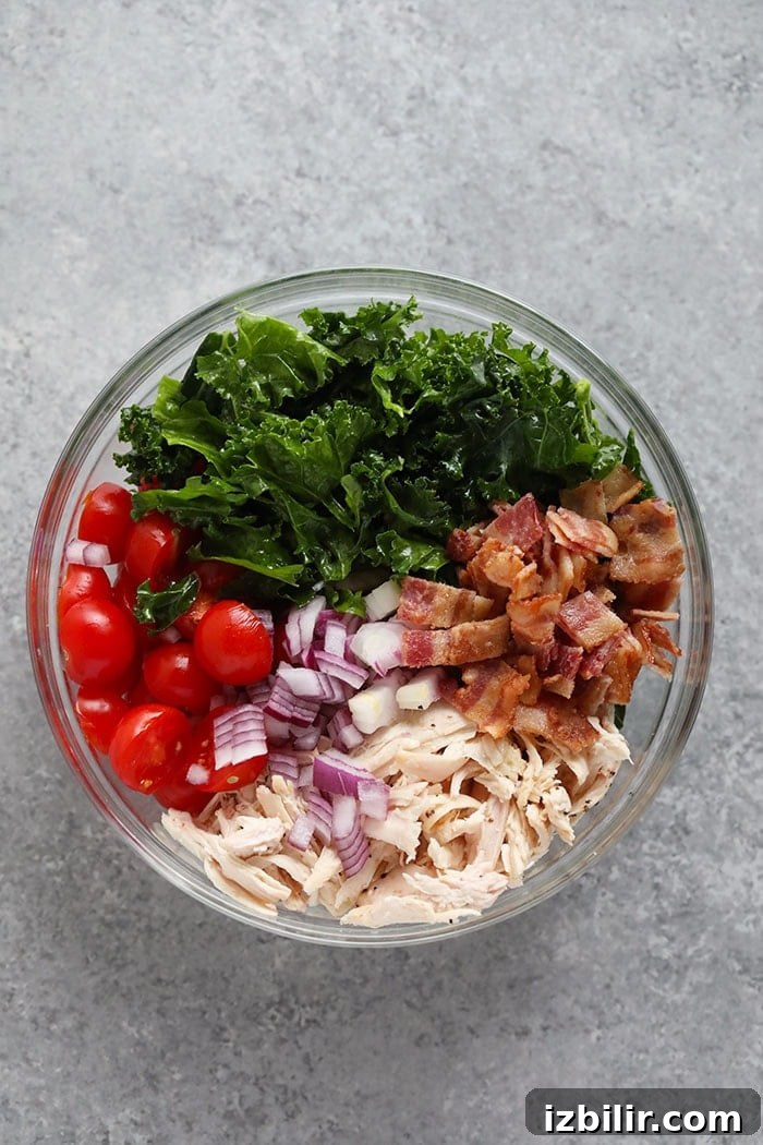 BLT Chicken Salad Ingredients healthy BLT chicken salad ingredients in a bowl