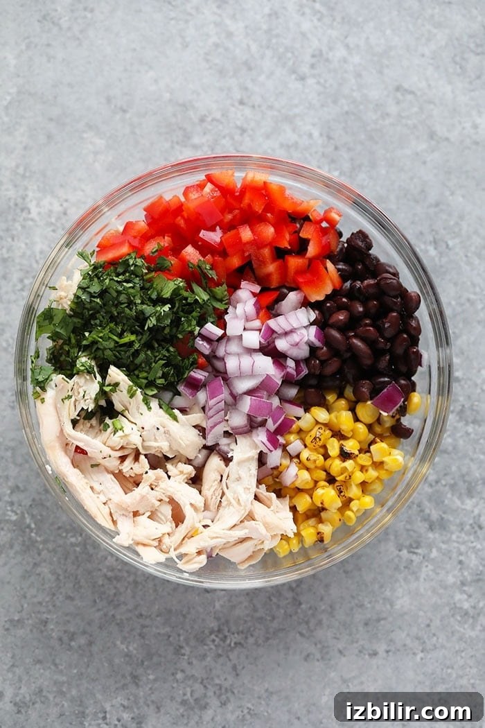 Southwest Chicken Salad ingredients Ingredients in a glass bowl for southwest salad