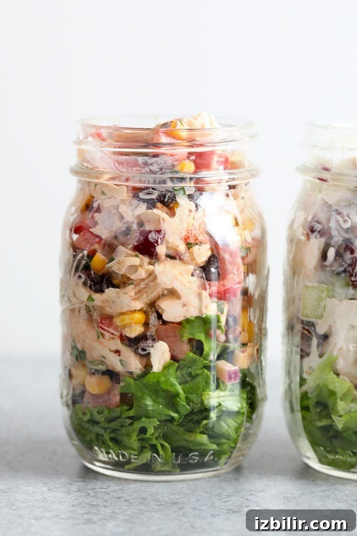Southwest Chicken Salad in a jar Southwest salad in a mason jar with lettuce