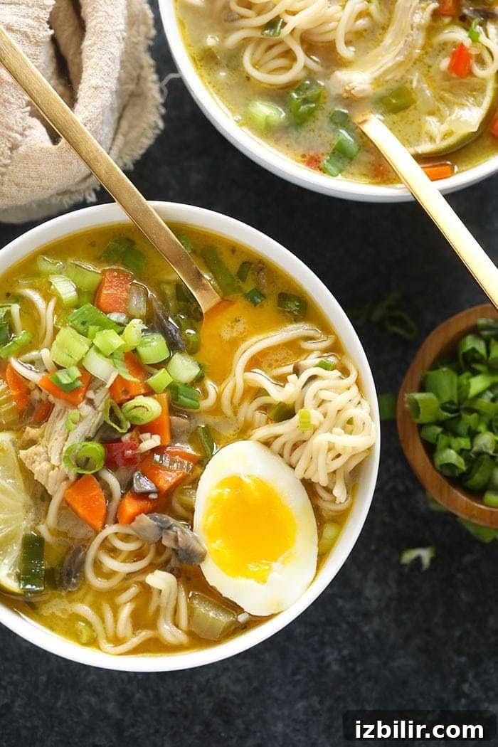asian chicken noodle soup in a bowl