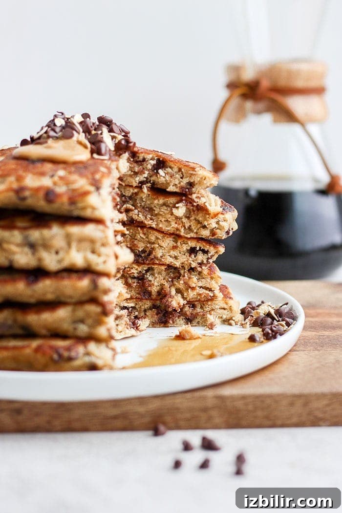 Sliced stack of pancakes with syrup stack of pancakes sliced with maple syrup