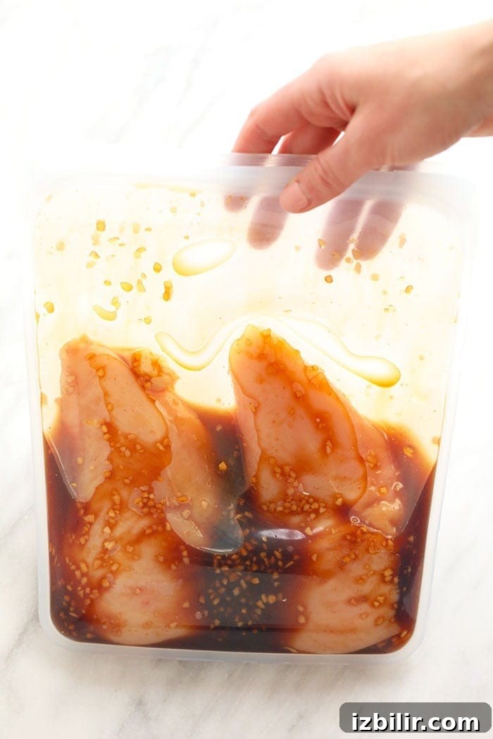 Chicken marinating in a resealable bag Chicken in a resealable bag marinating