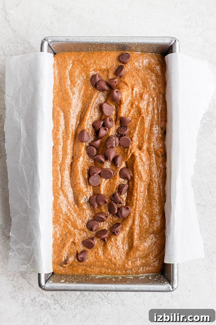 Pumpkin bread in loaf pan healthy pumpkin bread in a loaf pan ready to be baked.