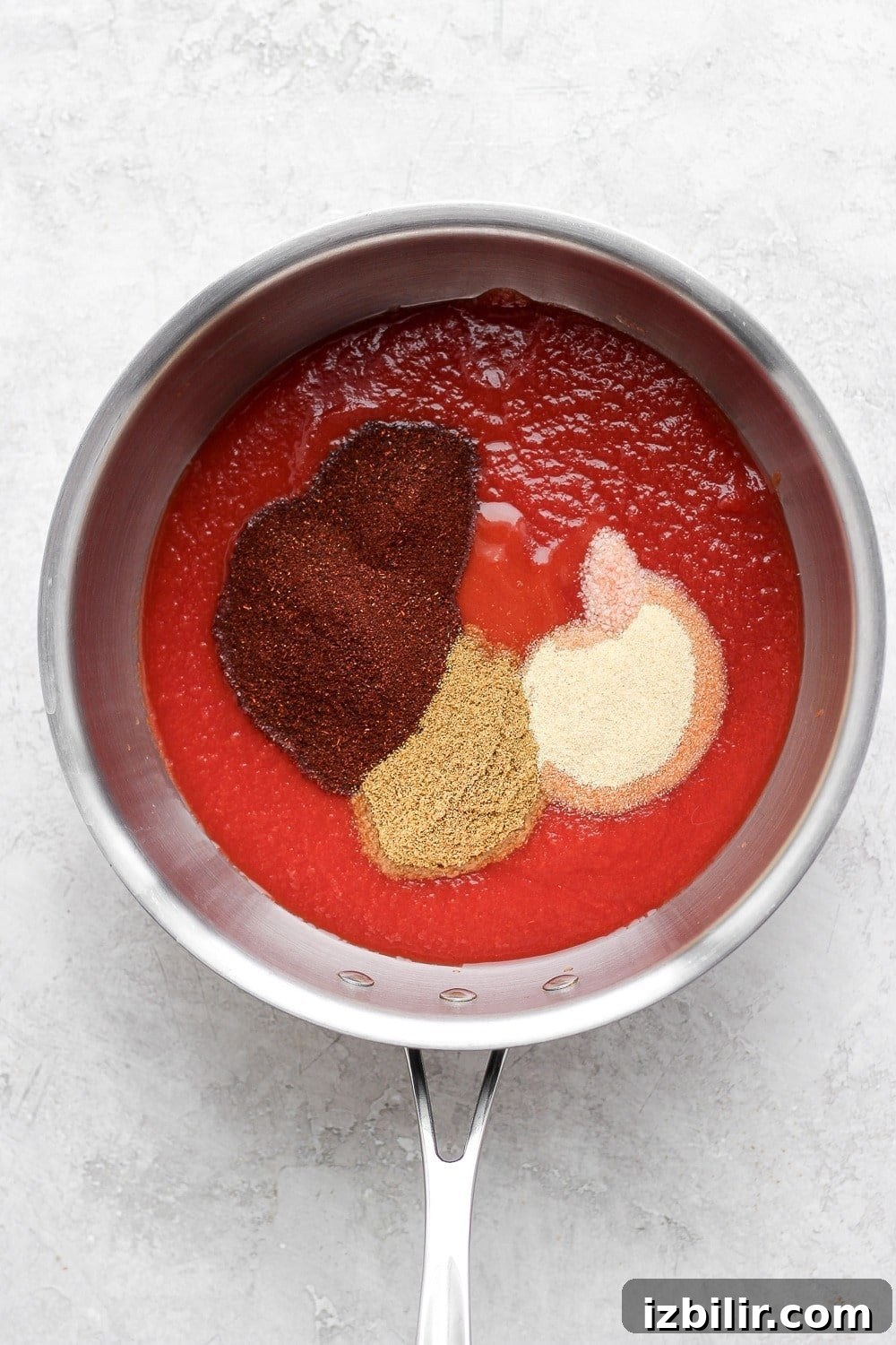 Enchilada sauce in a saucepan