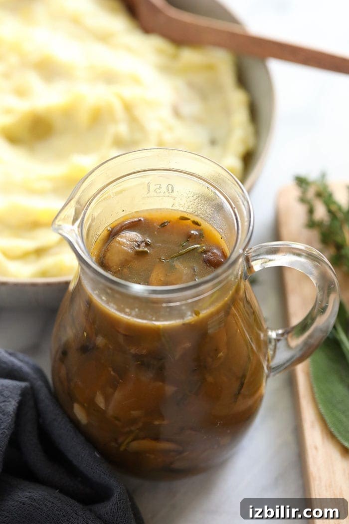 Mushroom gravy in a pour jar.