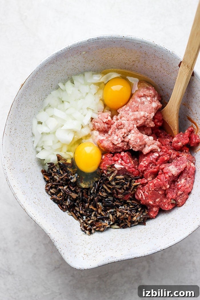 wild rice meatloaf ingredients in a bowl ready to be mixed