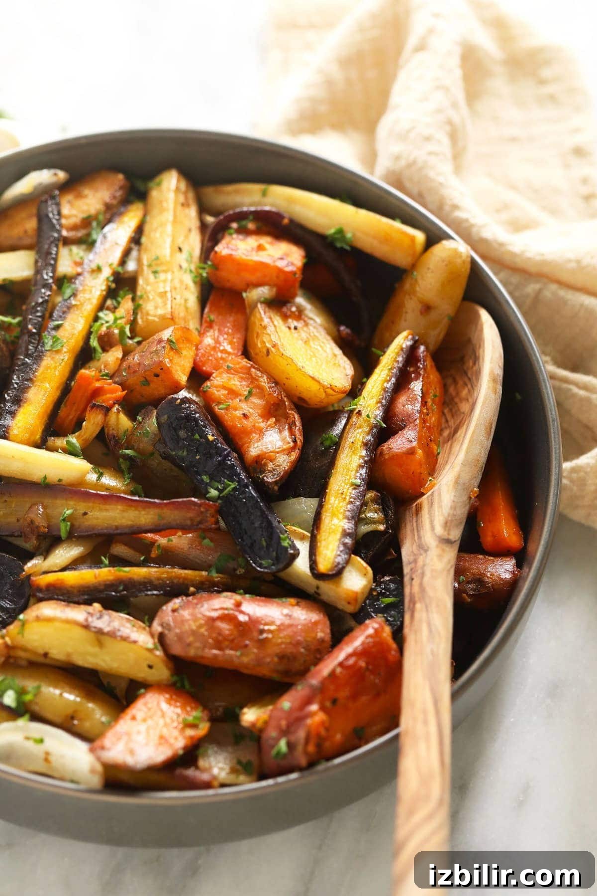 Roasted root vegetables in a bowl ready to be served