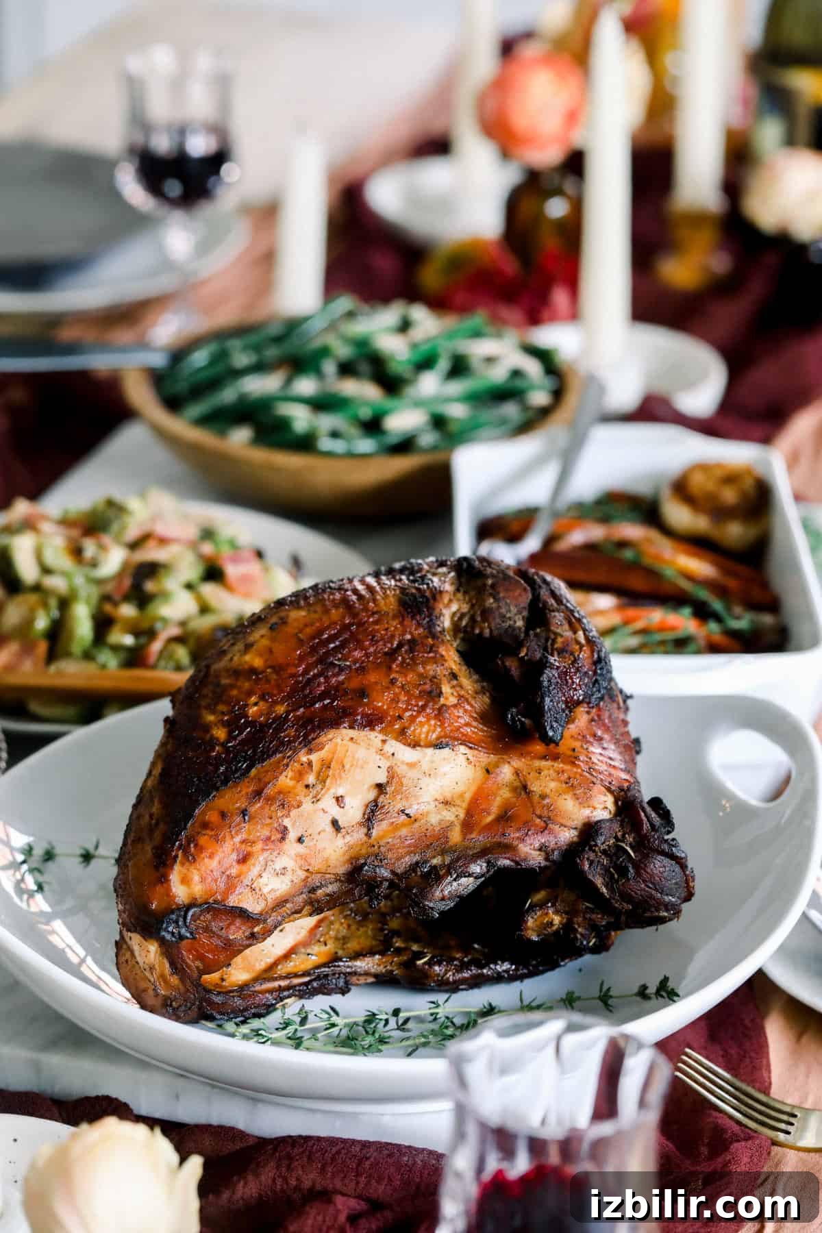 A table with a sous vide turkey and vegetables on it.