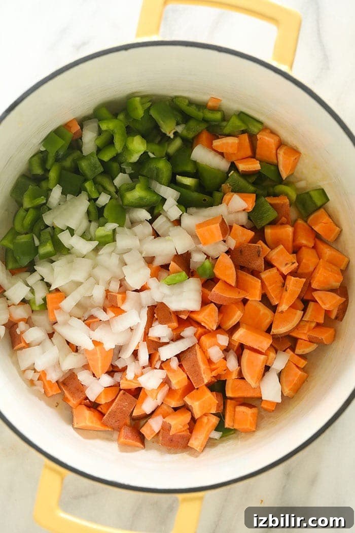 Vegetarian Chili with vegetables in pot vegetables in stockpot