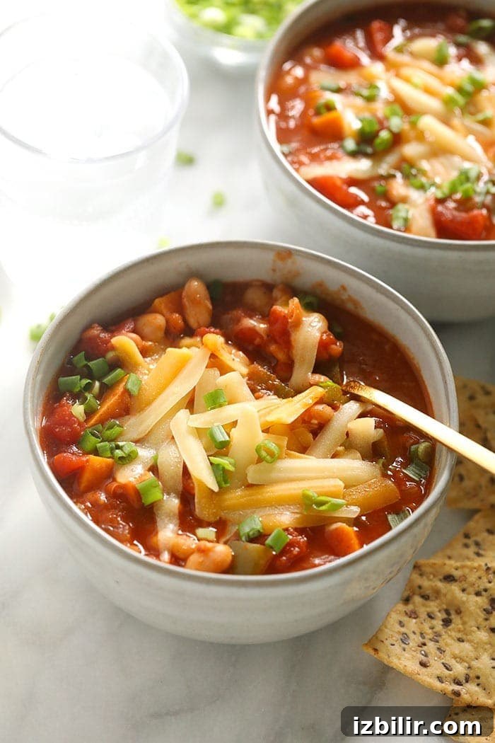 Vegetarian chili in bowl with cheese chili in bowl with cheese