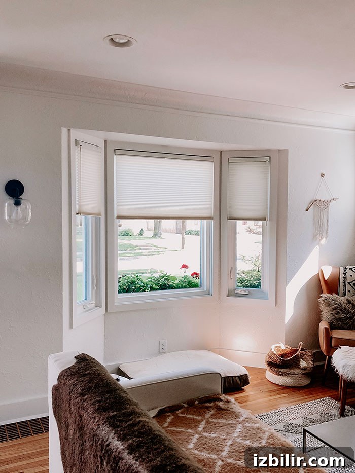 Loving our new custom window treatments -- Duette Collection of Honeycomb Shades by Hunter Douglas. bay window with custom window treatments
