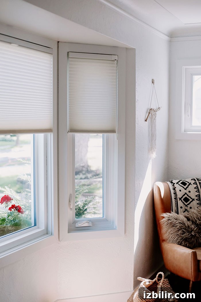 Loving our new custom window treatments -- Duette Collection of Honeycomb Shades by Hunter Douglas. white custom hunter douglas blinds in window