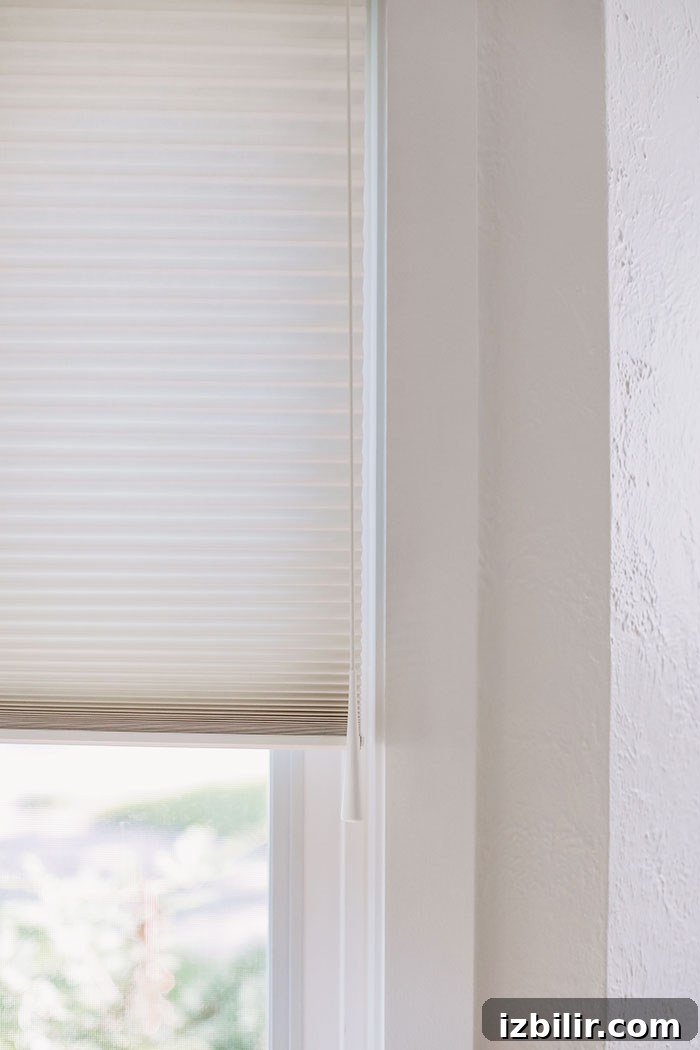Loving our new custom window treatments -- Duette Collection of Honeycomb Shades by Hunter Douglas. window pull
