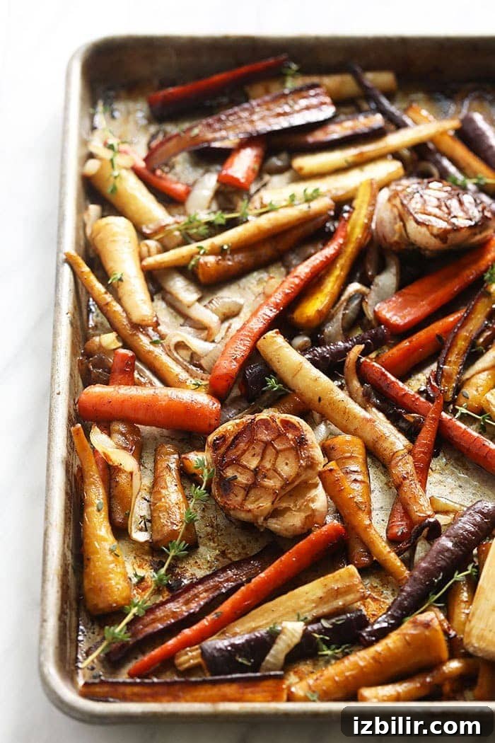 Honey Balsamic Roasted Carrots balsamic roasted carrots on a baking pan