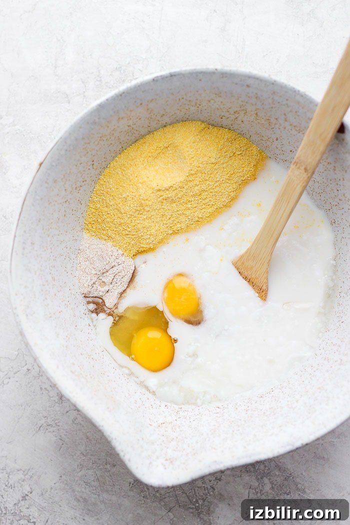 Cornbread ingredients in a mixing bowl cornbread ingredients in mixing bowl