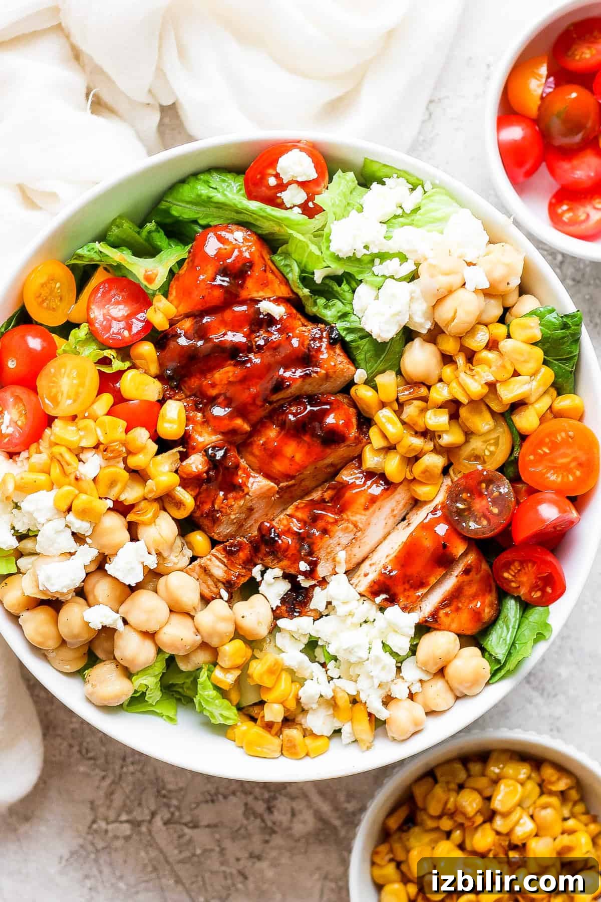 BBQ chicken salad with corn and tomatoes.