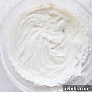 Cream cheese frosting in a bowl.