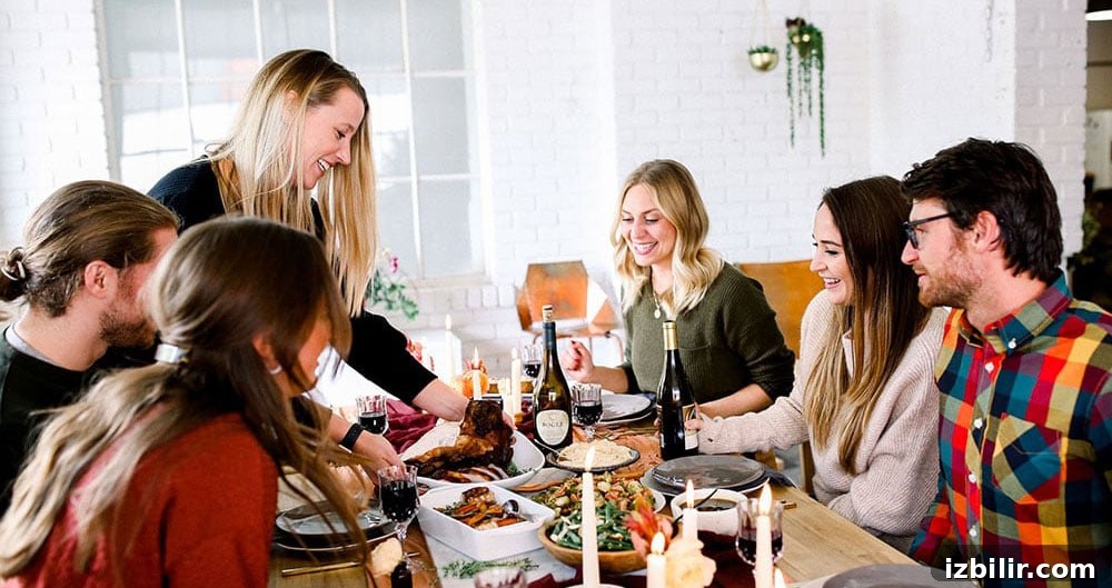 people gathering at table.