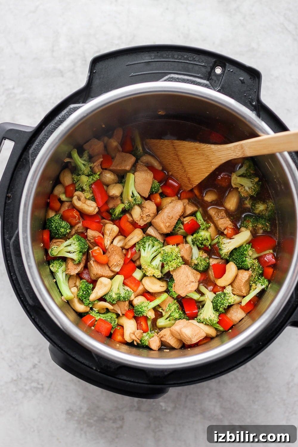 instant pot cashew chicken being cooked in the instant pot