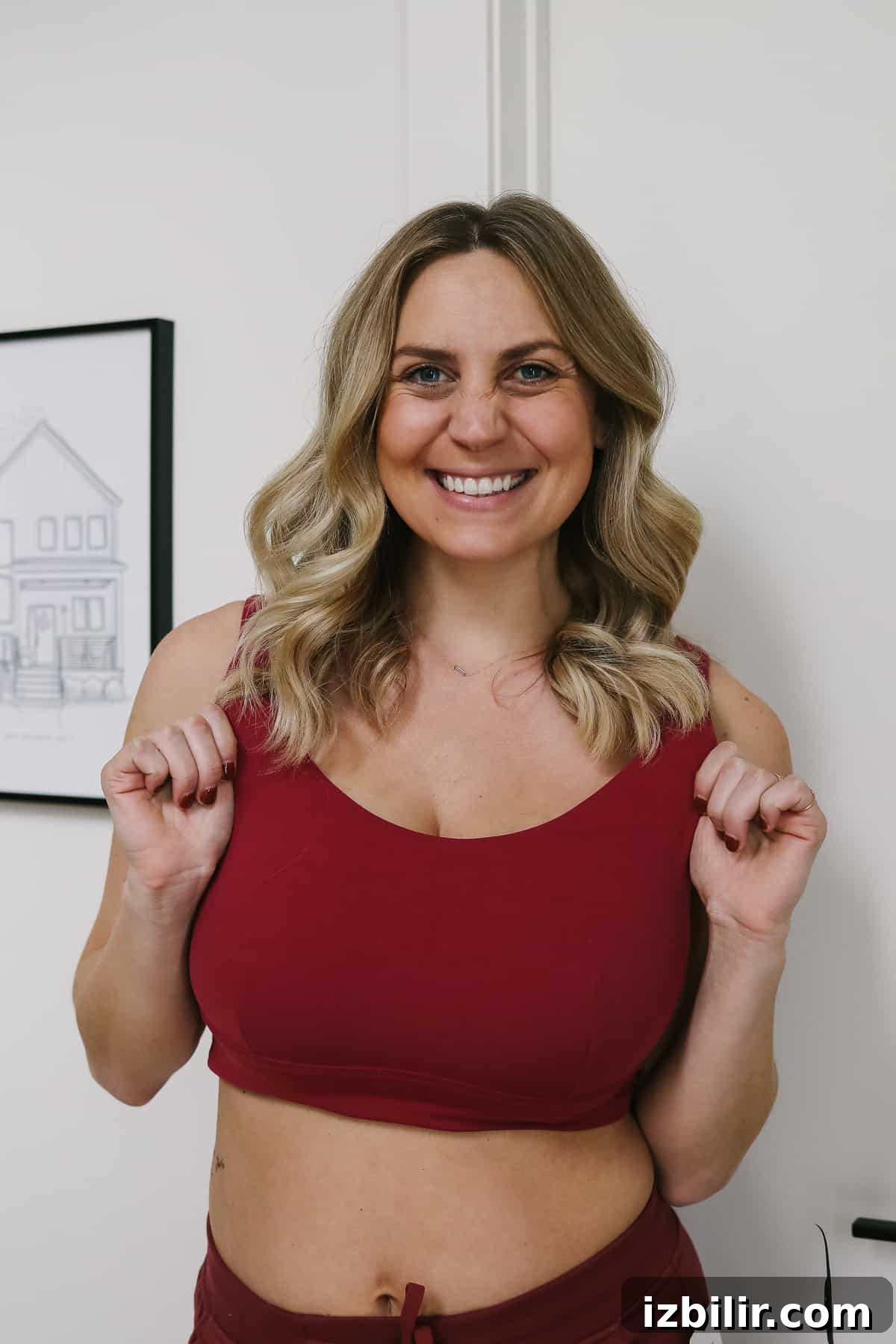 Woman wearing a red sports bra for workouts