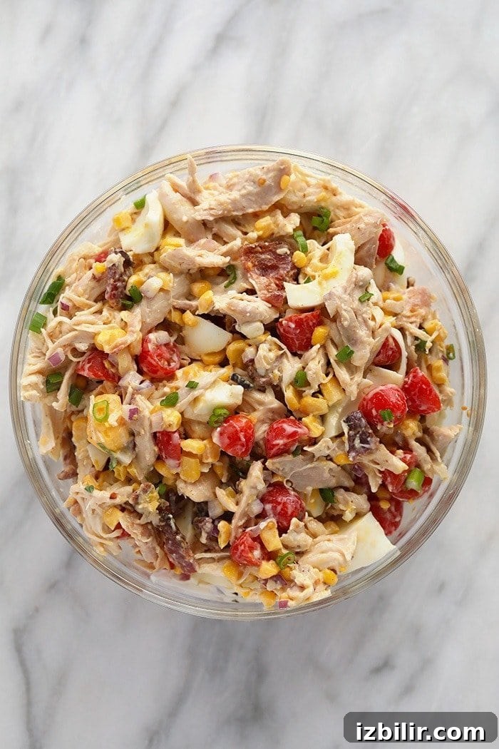 Rotisserie Chicken Cobb Salad ready to be served rotisserie chicken cobb salad in a bowl ready to be served