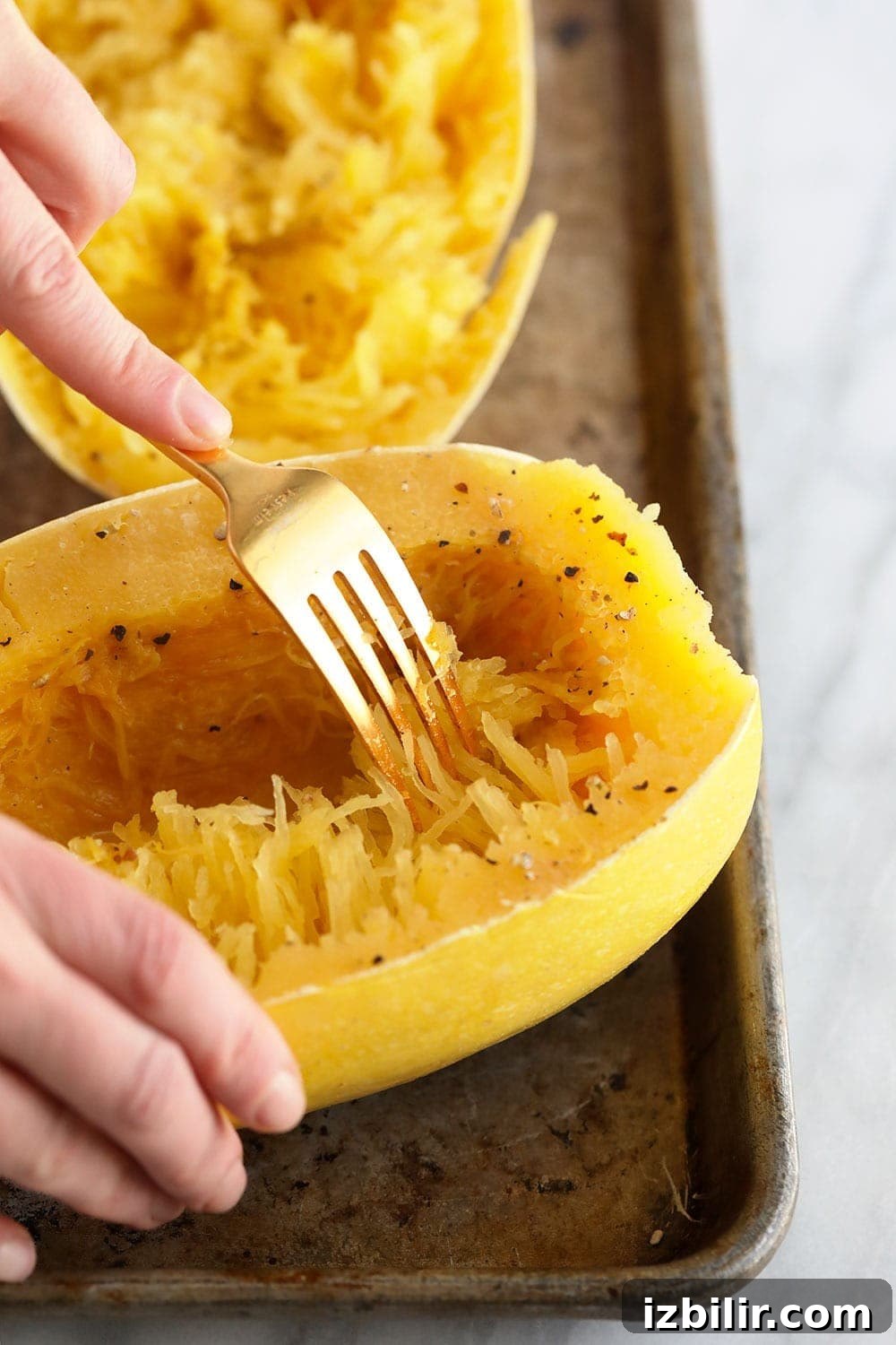 Shred spaghetti squash into noodles Softening spaghetti squash into noodles